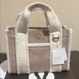 Lululemon Athletica Cream and boxy mini Tote faux shearling bag